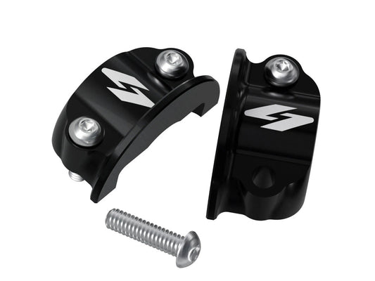 Pro-Line Perch Half Clamps – Black. Fits Softail 1984-2024, Dyna 1991-2017, Most Touring 1982-2024, Sportster 1982-2003 & FXR 1982-1994