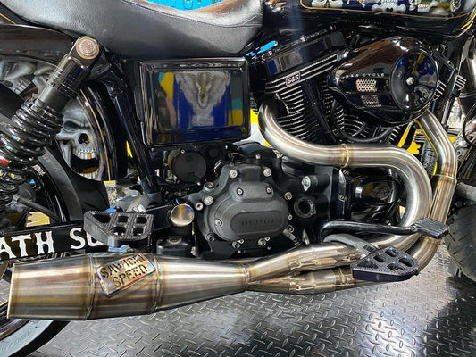 Shorty 2-into-1 Exhaust with Welded End Cap – Stainless. Fits Dyna 1991-2017.
